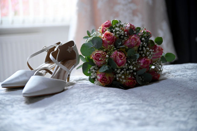 brides wedding shoes and bouquet 