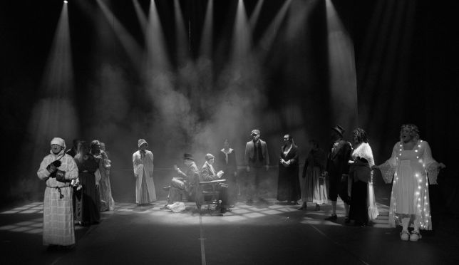 Actors and man on stage in Theatre stage show 